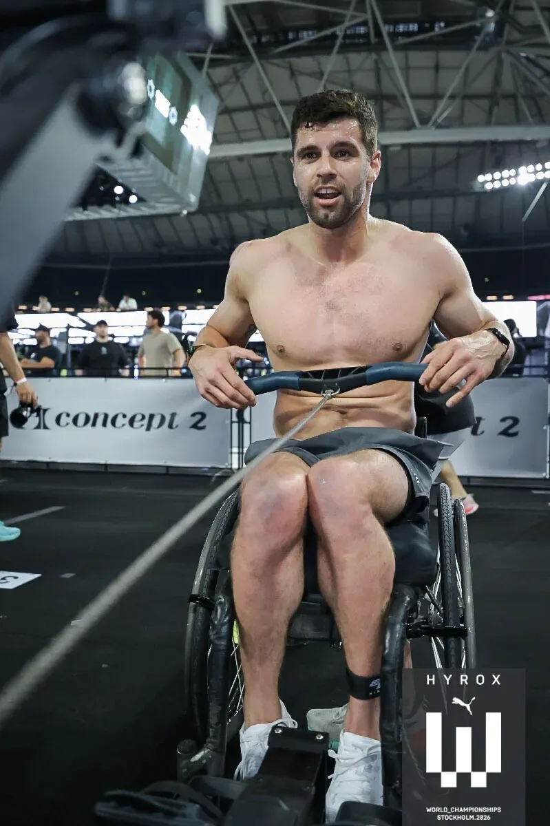 Tom Miazga completes his 900m row on a Concept2 erg during the HYROX World Championship race