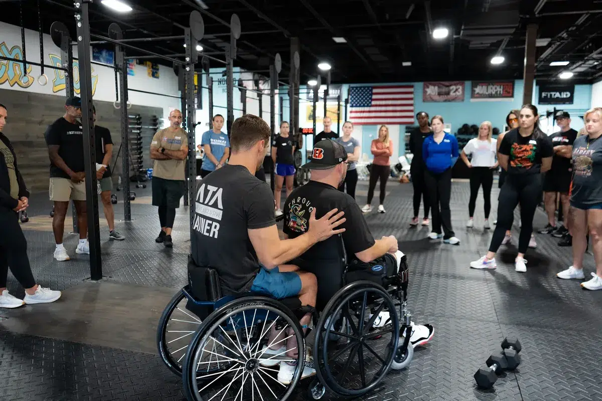 Tom Miazga teaches wheelchair spotting to trainers at an ATA education seminar
